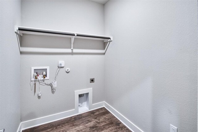 clothes washing area with gas dryer hookup, washer hookup, hardwood / wood-style floors, and electric dryer hookup