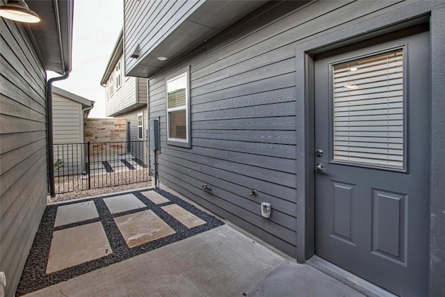 doorway to property featuring a patio area