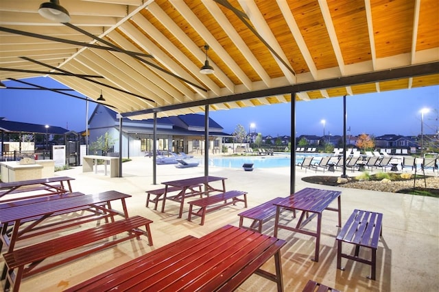 view of home's community with a patio and a swimming pool