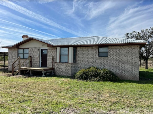 view of front of home with a front yard