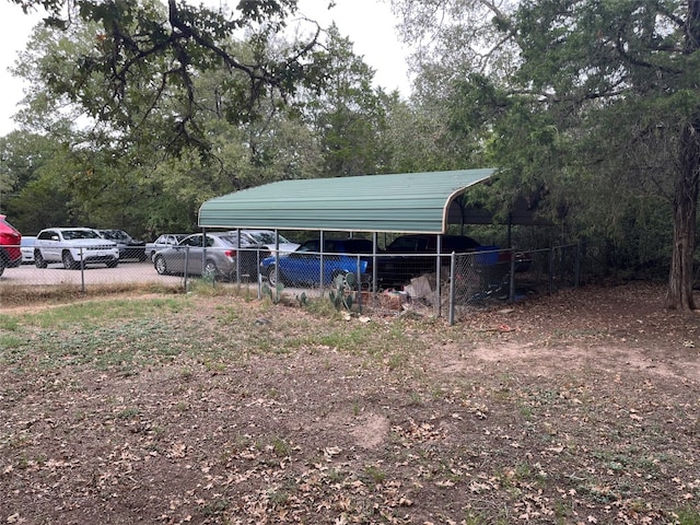 view of yard with a carport