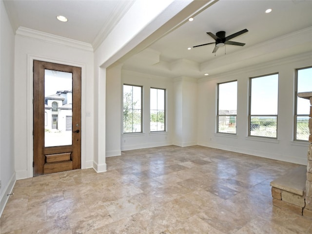 entryway featuring light tile flooring, ornamental molding, and ceiling fan