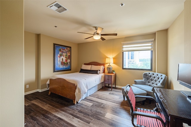 bedroom featuring ceiling fan and hardwood / wood-style flooring