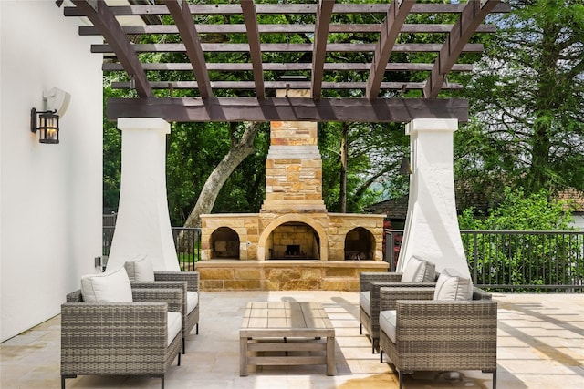 view of patio / terrace with a pergola and an outdoor living space with a fireplace