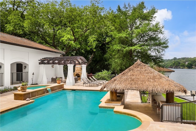 view of swimming pool featuring a pergola and a patio area