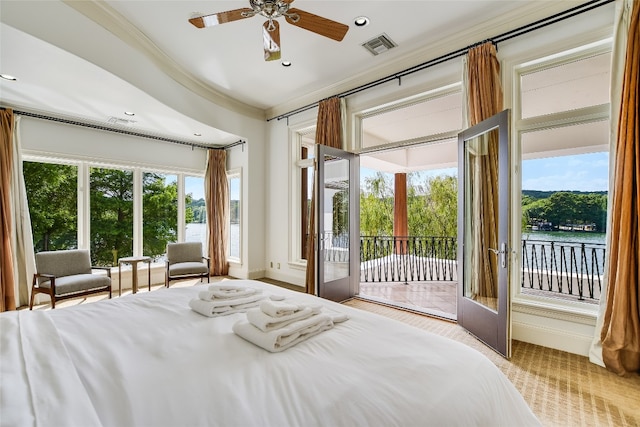 bedroom with multiple windows, crown molding, access to outside, and ceiling fan