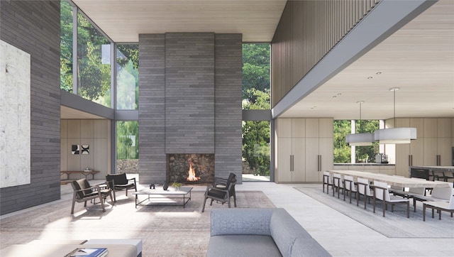 view of patio / terrace featuring an outdoor living space with a fireplace