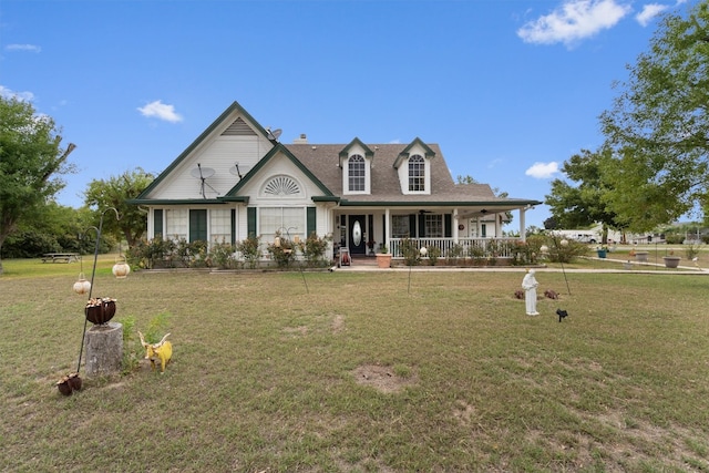 view of front of property featuring a front lawn and a porch