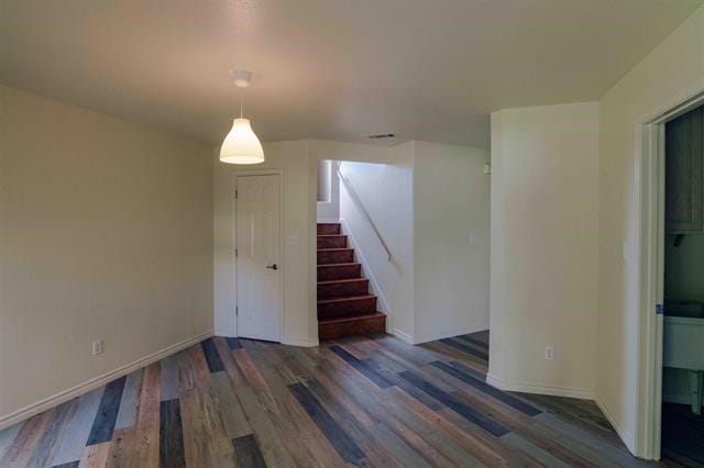 interior space with dark hardwood / wood-style flooring