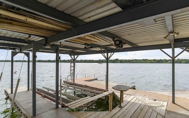 dock area featuring a water view