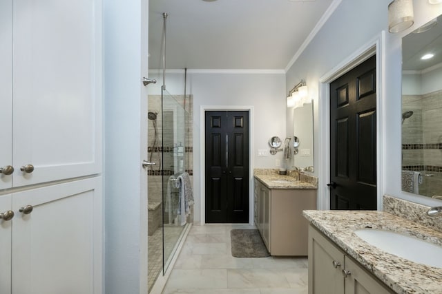 bathroom featuring dual vanity, tile flooring, a shower with door, and ornamental molding