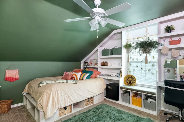 bedroom featuring lofted ceiling, ceiling fan, and dark colored carpet