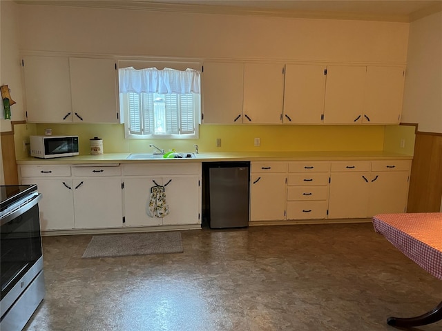 kitchen with stainless steel range with electric stovetop, dishwasher, sink, and white cabinets