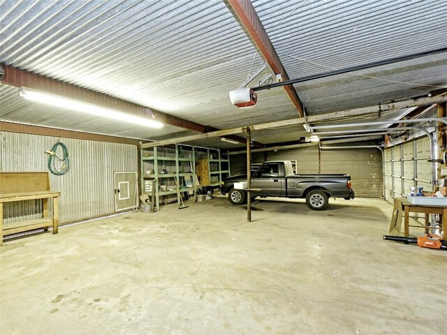 garage featuring a garage door opener