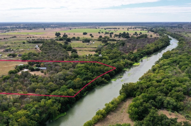1332 Fm 969, Bastrop, TX 78602 - aerial view of sparsely populated area featuring property boundaries highlighted and a large body of water
