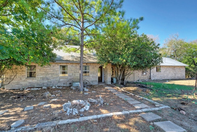 1332 Fm 969, Bastrop, TX 78602 - view of front facade featuring stone siding and a metal roof