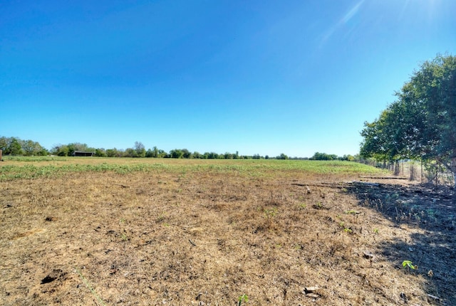 exterior space with a rural view