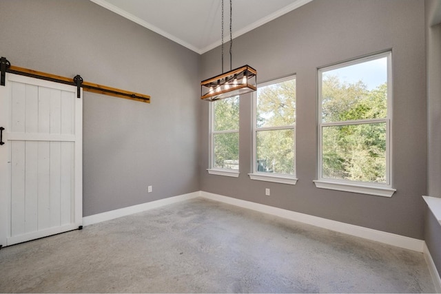 carpeted empty room featuring a barn door, crown molding, and a healthy amount of sunlight