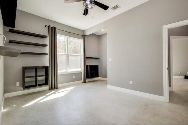 unfurnished living room with ceiling fan