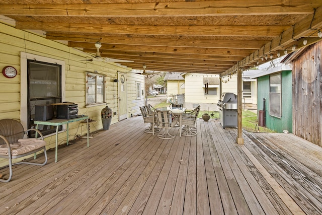 wooden deck with grilling area