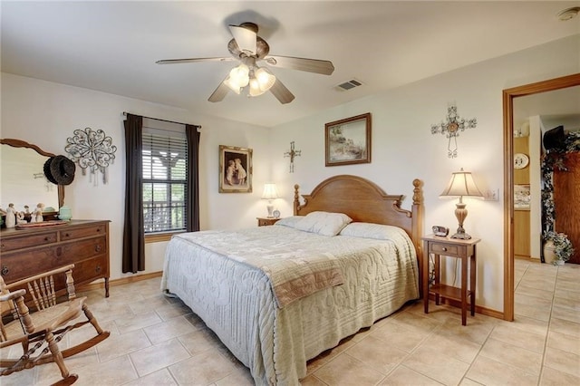 bedroom featuring ceiling fan and light tile flooring