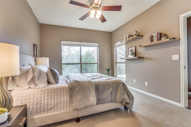 bedroom featuring ceiling fan and carpet