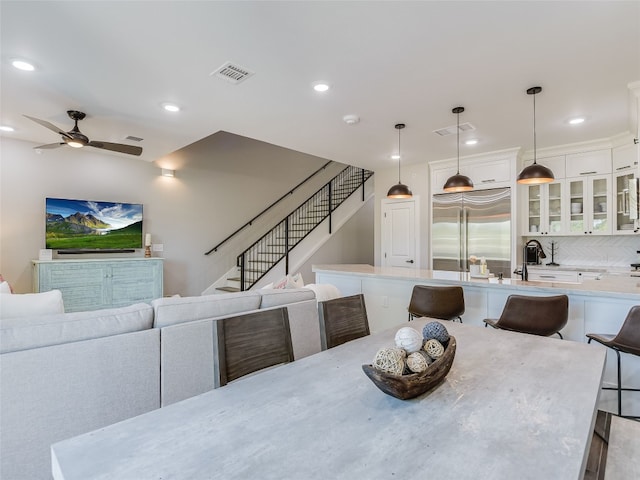 dining room with ceiling fan