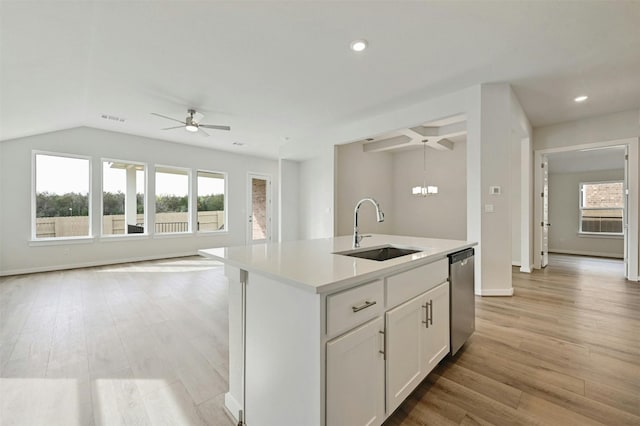 kitchen with light hardwood / wood-style flooring, sink, dishwasher, ceiling fan, and an island with sink