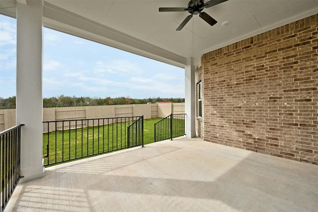 view of patio featuring ceiling fan