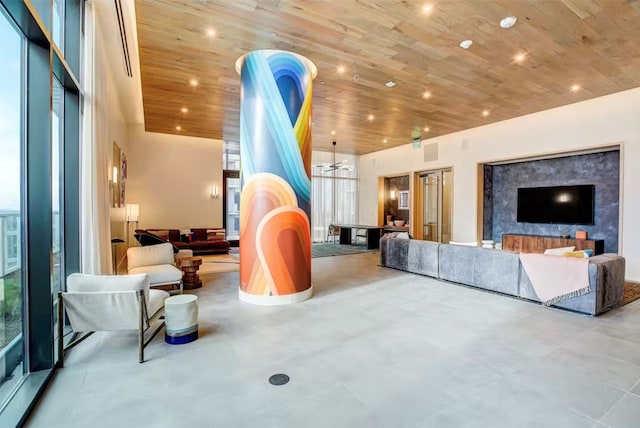 living room with light tile floors, a chandelier, and wooden ceiling