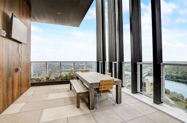 balcony featuring a water view