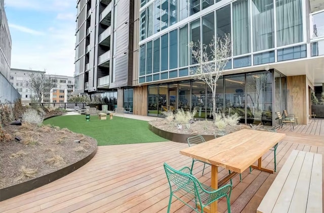 surrounding community featuring a wooden deck