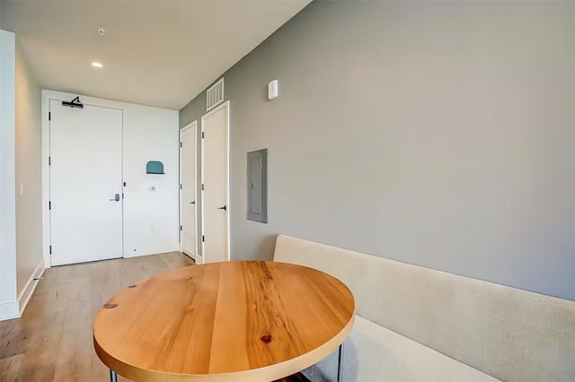 dining space featuring light wood-type flooring