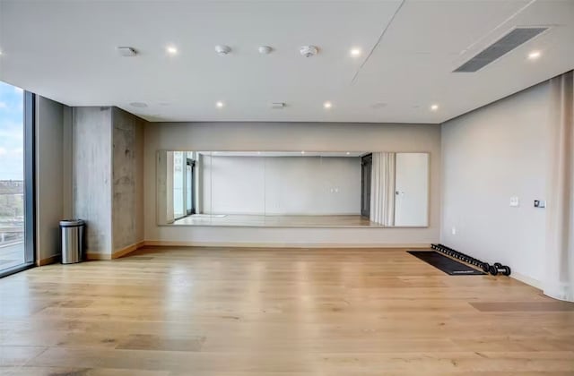 unfurnished living room featuring light hardwood / wood-style flooring