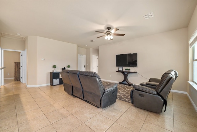 tiled living room featuring ceiling fan