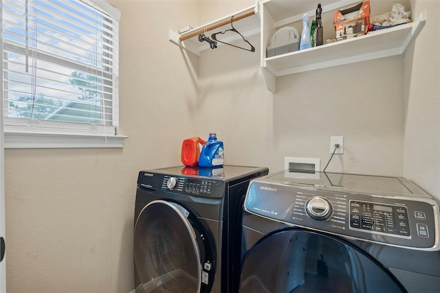 laundry area with washer and dryer