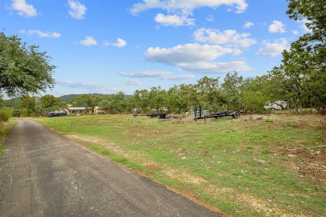 view of road featuring a rural view