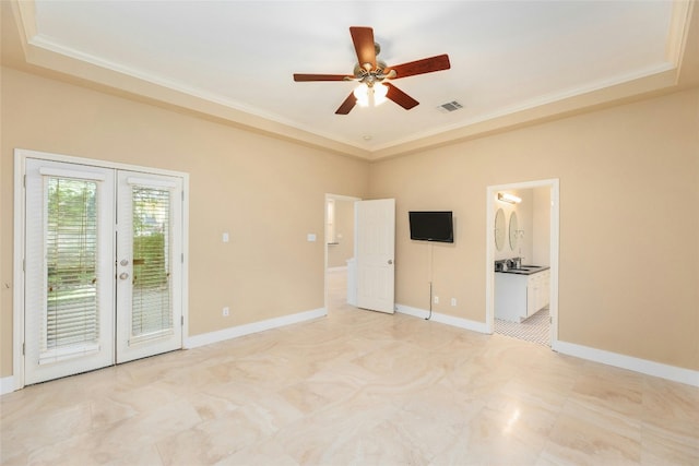 unfurnished room with ceiling fan, french doors, crown molding, and sink