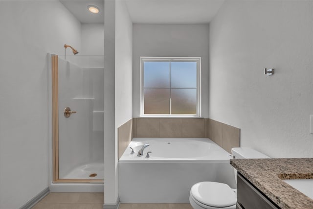 full bathroom featuring toilet, independent shower and bath, vanity, and tile patterned floors