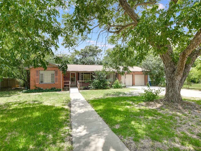 ranch-style house with a front yard and a garage