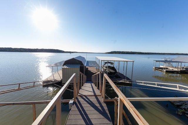 dock area featuring a water view