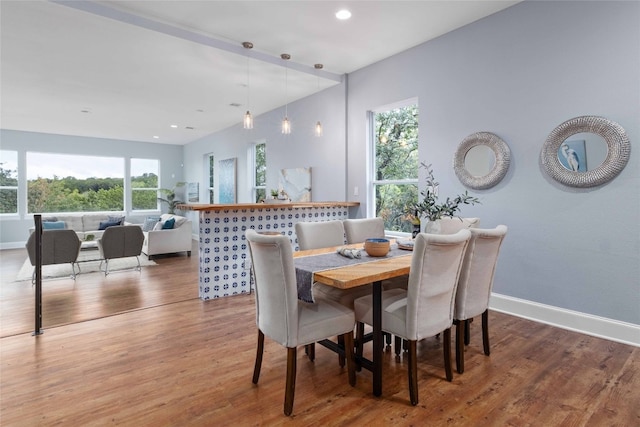 dining area with light wood-type flooring