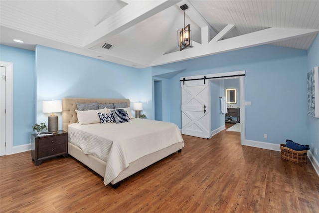 bedroom with a barn door, vaulted ceiling with beams, a notable chandelier, and dark hardwood / wood-style flooring