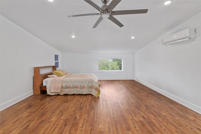 bedroom featuring an AC wall unit, ceiling fan, and dark hardwood / wood-style flooring