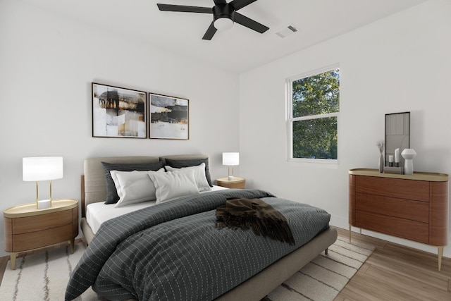 bedroom featuring ceiling fan and light wood-type flooring