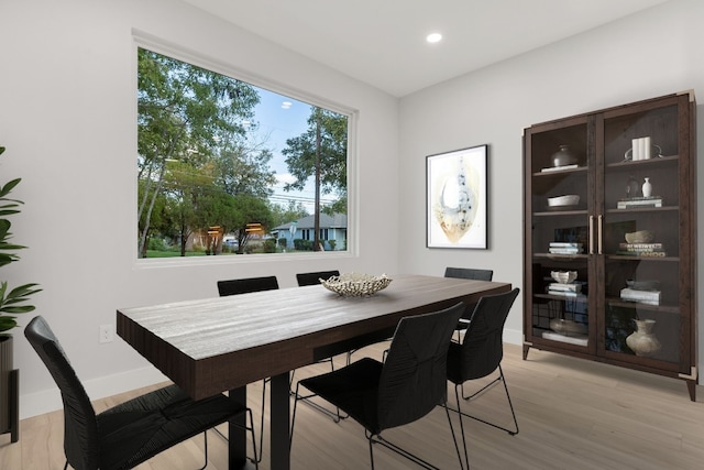 dining space featuring light hardwood / wood-style floors