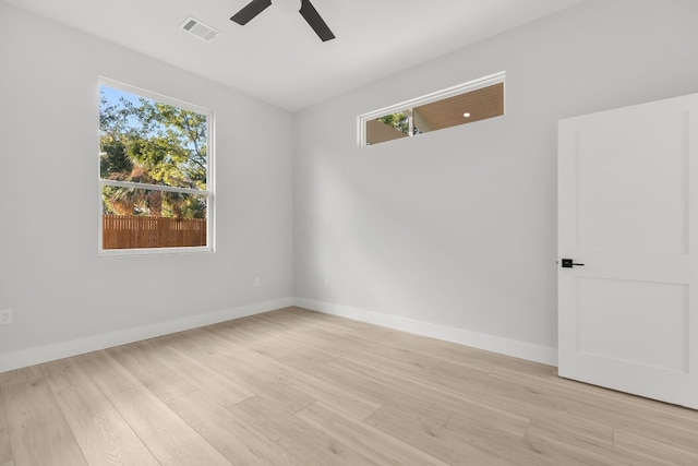 unfurnished room with ceiling fan and light hardwood / wood-style flooring