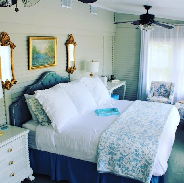 bedroom featuring dark wood-type flooring and ceiling fan