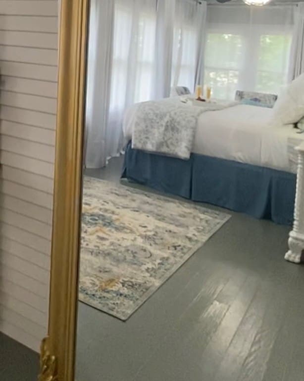 bedroom featuring hardwood / wood-style floors