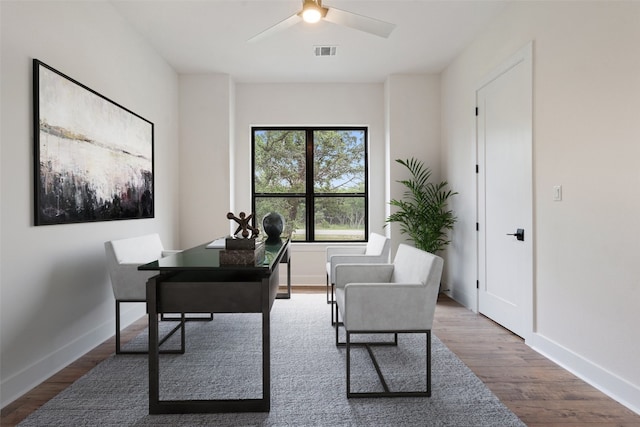 office area with hardwood / wood-style floors and ceiling fan